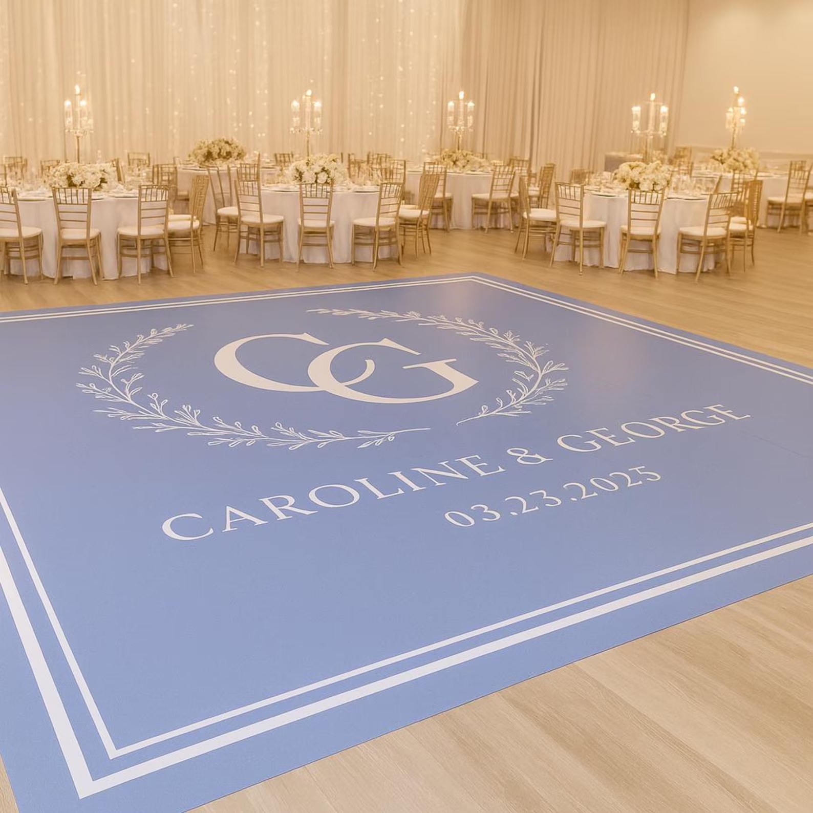 Custom printed vinyl wrap dance floor with couple's initials at a Denver wedding